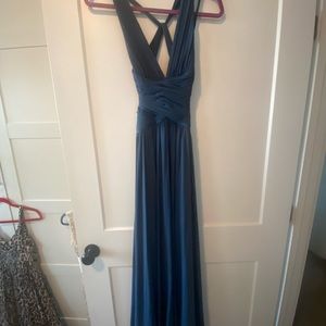 Super flattering evening gown. Stretchy material but size XS in waste